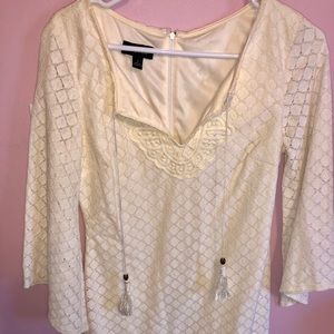 Beautifully detailed cream dress